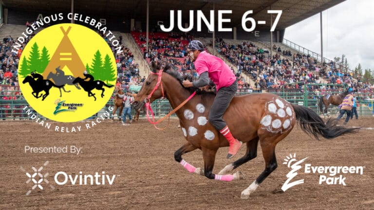 A bareback rider on a brown horse adorned with white painted spots gallops across a dirt track before a grandstand packed with spectators, with text indicating an Indigenous Celebration Indian Relay Racing event on June six and seven sponsored by Ovintiv and Evergreen Park.