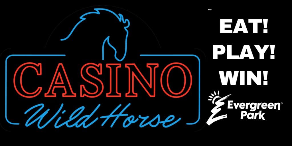 A vibrant neon sign for Wild Horse Casino featuring a horse head emblem is displayed alongside the phrases Eat, Play, Win and the Evergreen Park logo on a black background.